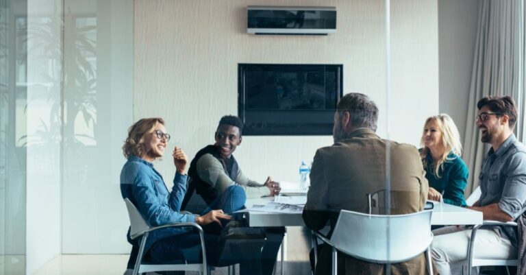 Team of people building a recruiting strategy using Addison Group's tips