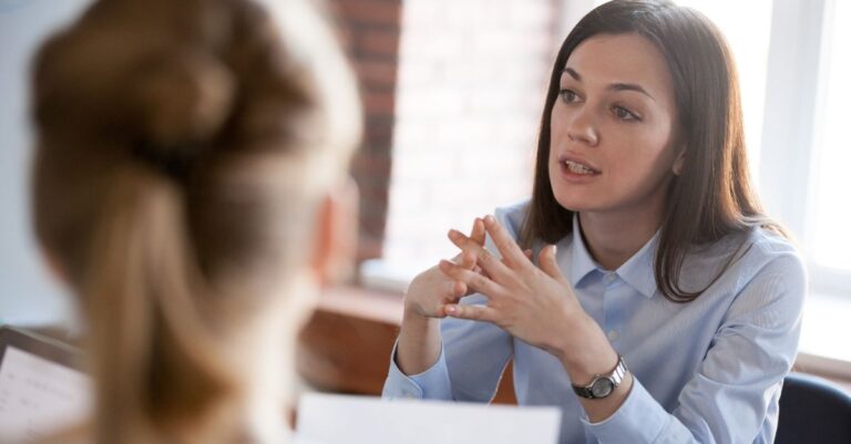 Addison Group insight header image featuring a woman talking to another woman