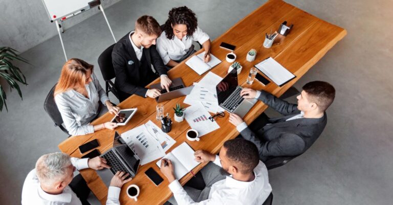Group of people having a meeting about workforce planning with Addison Group